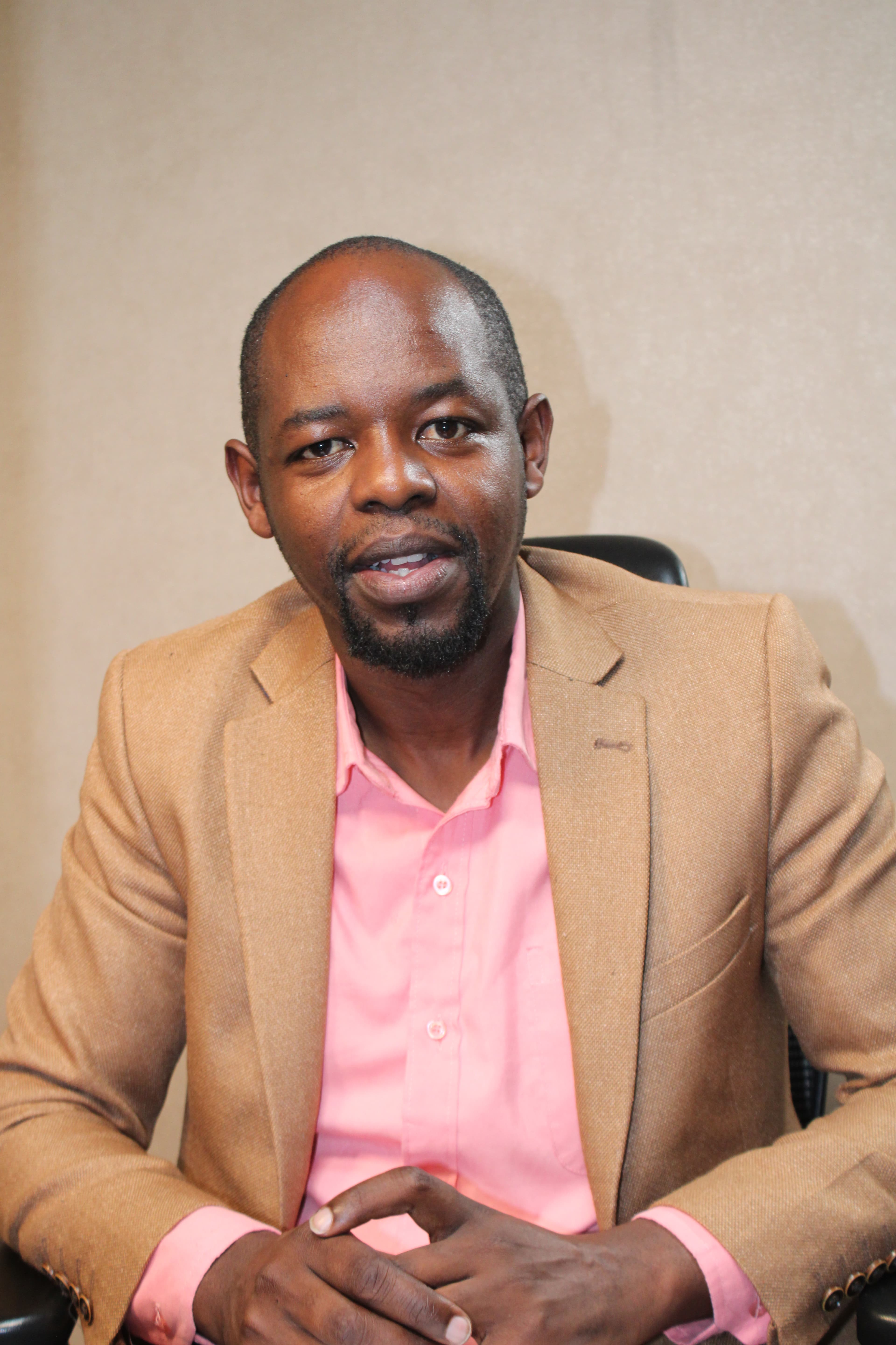 Dr. Alex Kamau - Financial Consultant & Audit Expert